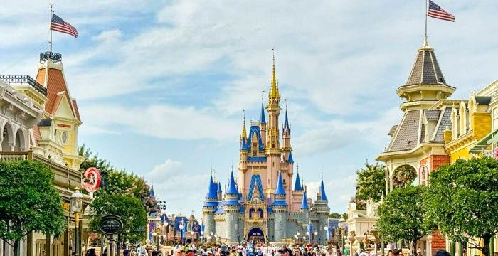 2024-wdw-atmo-mk-cinderella-castle-crowds-main-street-usa-stock-700x448.jpg