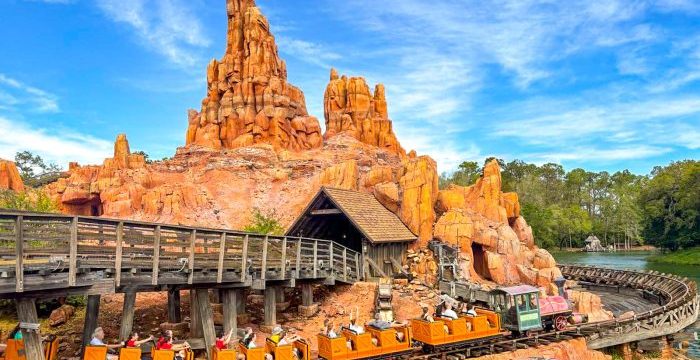 2024-wdw-atmo-mk-frontierland-big-thunder-mountain-railroad-ride-roller-coaster-stock-700x525.jpg